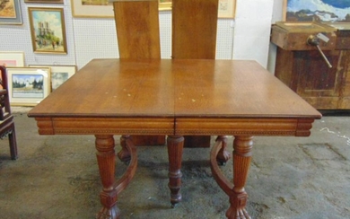 Square oak dining room table with 4 leaves, clean claw