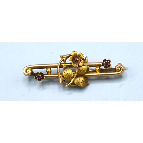 A 15ct Gold Bar Brooch of Foliate Form set with two small ga...