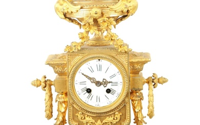 A 19TH CENTURY FRENCH ORMOLU MANTEL CLOCK with an...