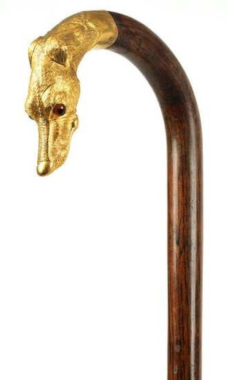 A 19TH CENTURY ROSEWOOD AND GOLD METAL WALKING STICK