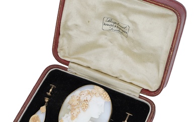 A 19th century shell cameo brooch and pair of earrings, the oval...
