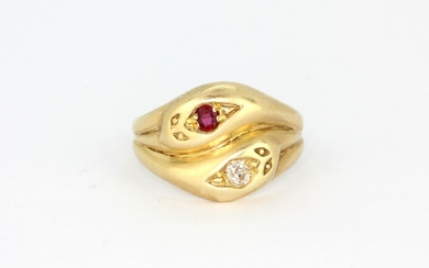 A 9ct yellow gold snake shaped ring set with a brilliant cut diamond and ruby, (N).