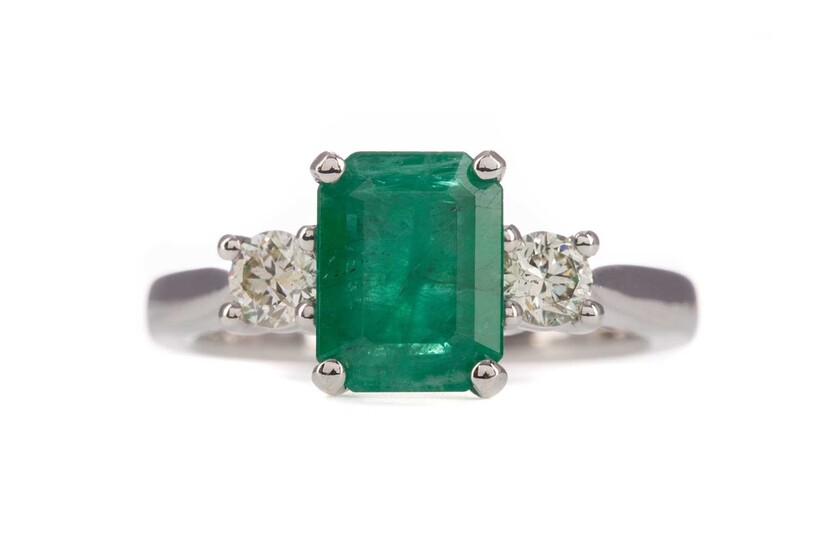 A CERTIFICATED TREATED EMERALD AND DIAMOND RING