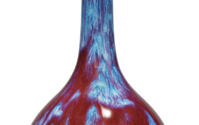 A CHINESE FLAMBÉ-GLAZED BOTTLE VASE, QIANLONG SIX-CHARACTER INCISED SEAL MARK AND OF THE PERIOD (1736-1795)
