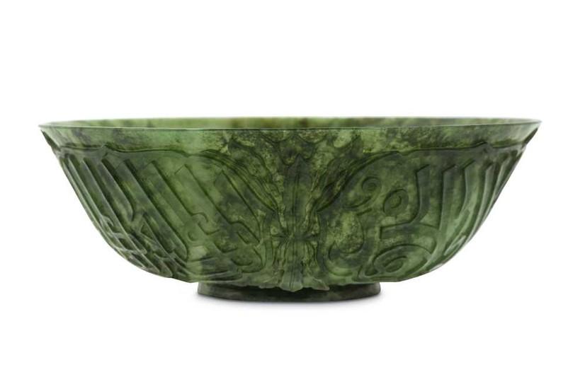 *A CHINESE SPINACH JADE BOWL WITH ARABIC CALLIGRAPHY China, 19th century