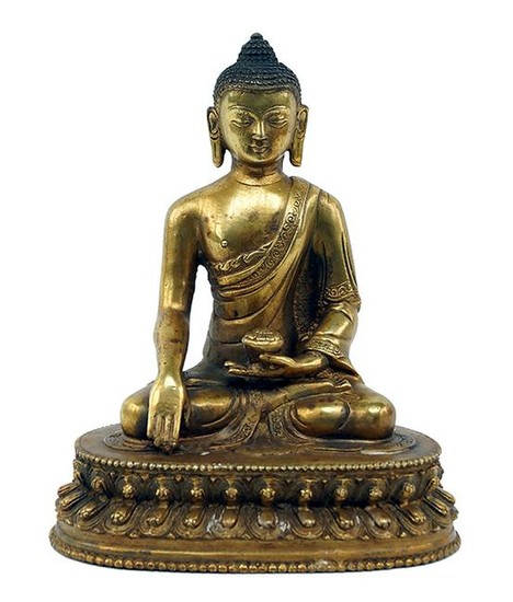 A Chinese Gilt Metal Buddha.