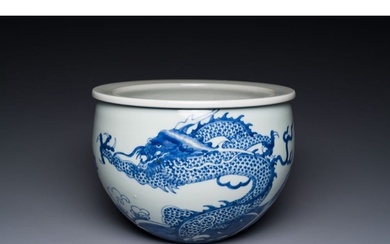 A Chinese blue and white 'dragons and carps' jardiniere, 19t...