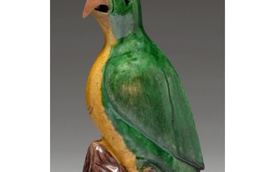 A Chinese glazed biscuit model of a hawk, 19th c, the bird w...
