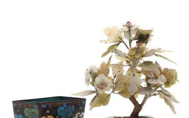 A Chinese ornamental jade tree. Enclosed a separate cloisonné enamel cachepot, decorated...