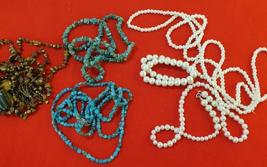 A GROUP OF COSTUME JEWELLERY