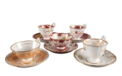A GROUP OF FIVE H & R DANIEL ACANTHUS SHAPE CUPS AND SAUCERS...