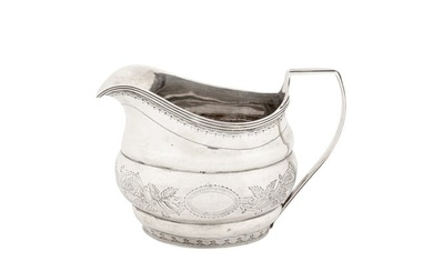 A George III Irish provincial silver milk jug, Cork circa 1790 by Samuel Green