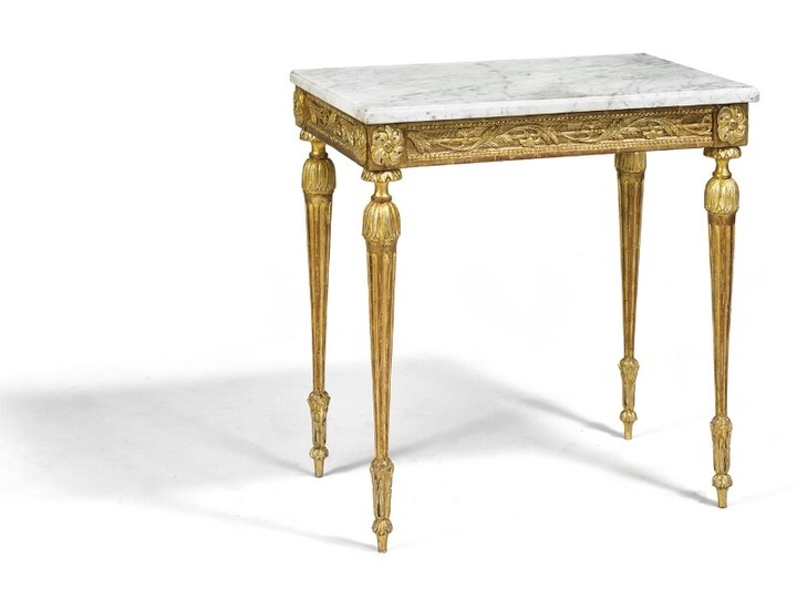 A Gustavian giltwood console table with later marble top. Sweden, late 18th century. H. 77 cm. W. 73 cm. D. 48 cm.