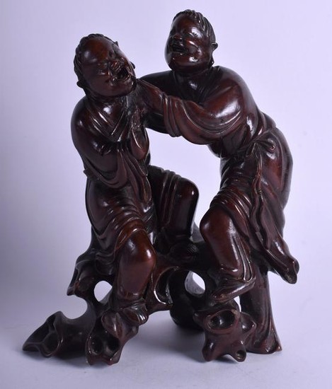 A LATE 19TH CENTURY CHINESE CARVED HARDWOOD FIGURE OF