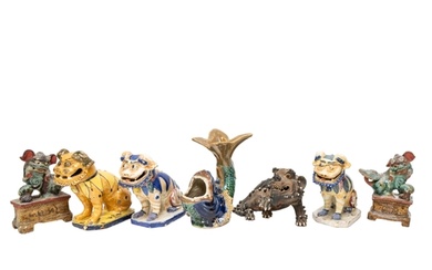 A MIXED GROUP OF CHINESE POTTERY FOO DOG MODELS AND A FISH M...