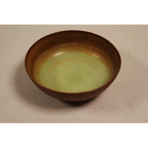 A Poole Pottery "Guy Sydenham" brown and green fleck bowl.