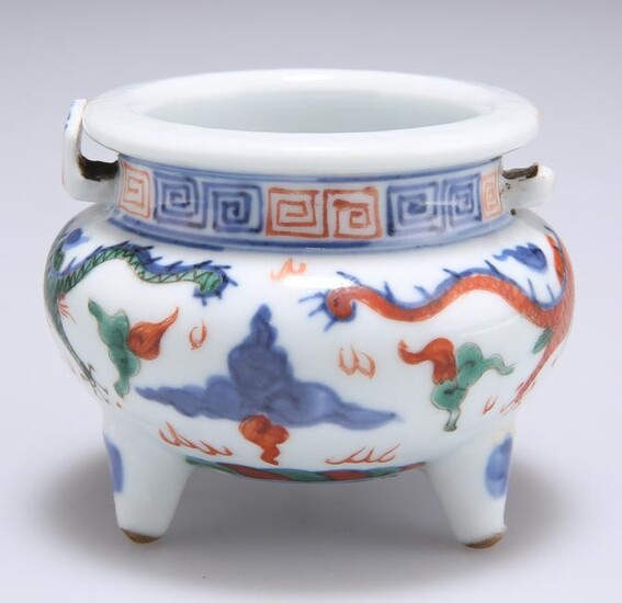 A SMALL CHINESE DOUCAI PORCELAIN TRIPOD CENSER, typical