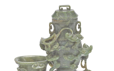 A SPINACH JADE 'DRAGON AND PHOENIX' VASE AND COVER 18th/19th...