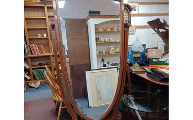 A Sheraton style mahogany and inlaid cheval mirror, with swi...