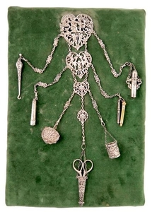 A Victorian silver chatelaine, by William Harrison…