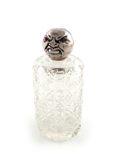 A Victorian silver-mounted glass scent bottle