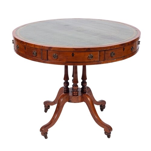 A Victorian yew wood and leather inset library drum table, m...