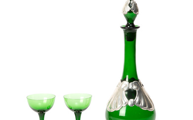 A decanter and two glasses, green glass and tin, Art Nouveau, early 20th century.