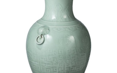A large Chinese moulded celadon vase, probably 19th century