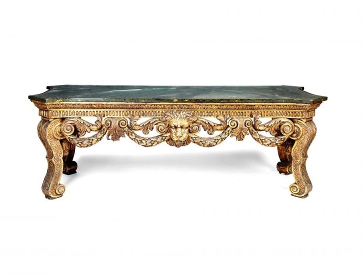 A large George II style carved giltwood side table, circa 1900, in the manner of William Kent