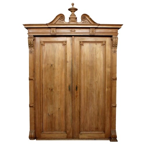 A late 19th century French architectural style pine armoire,...