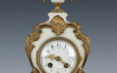 A late 19th century French ormolu mounted white marble mantel clock, the eight day movement with pla