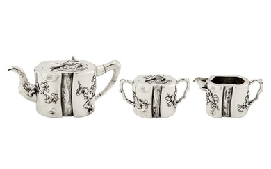 A late 19th / early 20th century Chinese export silver three-piece tea service, Canton or Shanghai circa 1900 by An Chang, retailed by Hung Chong of Shanghai