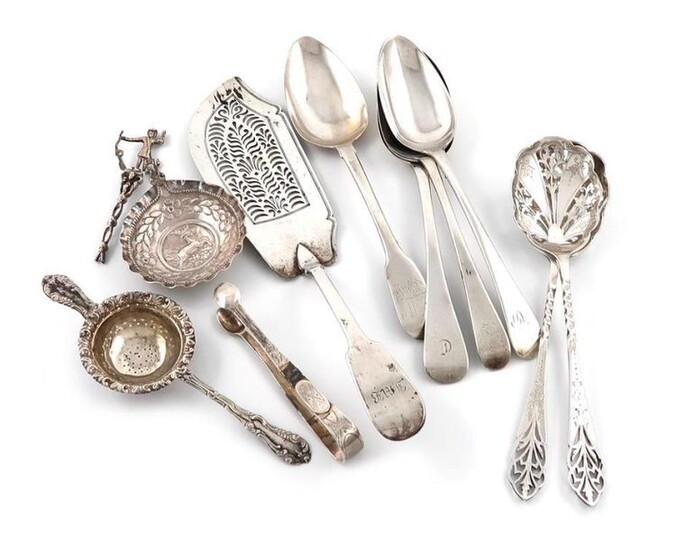 A mixed lot of silver flatware, various dates and makers, comprising: a George IV Fiddle pattern fish slice, four tablespoons, a pair of pierced fruit serving spoons, a pair of tongs, a tea strainer and a Dutch spoon, (handle damaged), approx. weight...