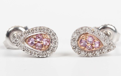 A pair of 18ct white gold, pink sapphire and diamond earstuds, each in a drop shaped design, mounted