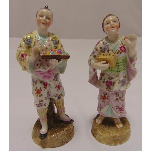 A pair of 19th century continental figurines wearing orienta...