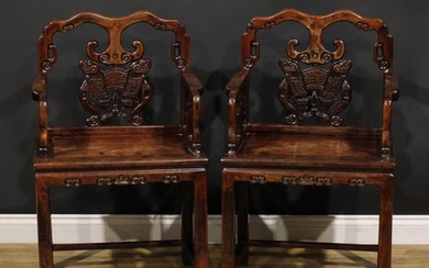 A pair of Chinese hardwood taishi armchairs, each with a sha...