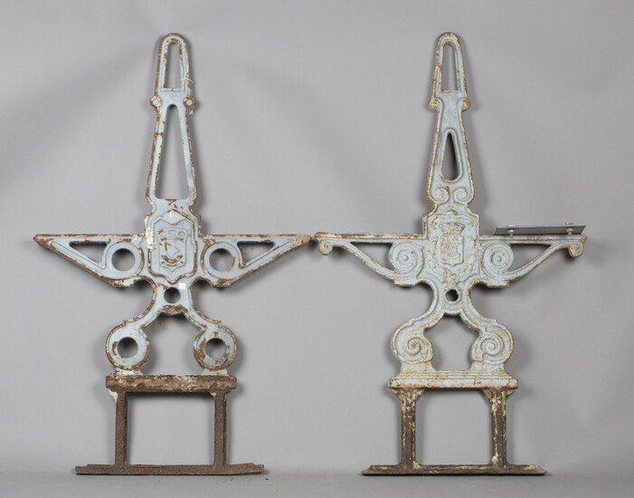 A pair of French cast iron garden double-sided bench ends, detailed 'JAF 1965' and bearing