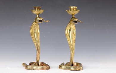 A pair of candlesticks, 1.H.20th c., standing...
