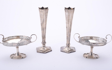 A pair of oval twin handled pedestal dishes