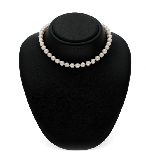 NOT SOLD. A pearl necklace set with numerous cultured pearls and with a clasp of...