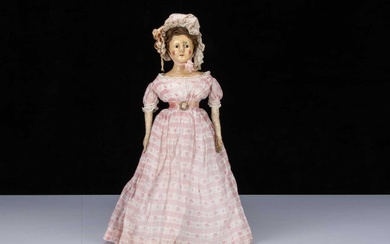 A rare early 19th century English papier-mâché shoulder-head doll