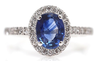 A sapphire and diamond ring set with a sapphire weighing app. 1.49 ct. encircled by diamonds, mounted in 18k white gold. Size 52.5. – Bruun Rasmussen Auctioneers of Fine Art