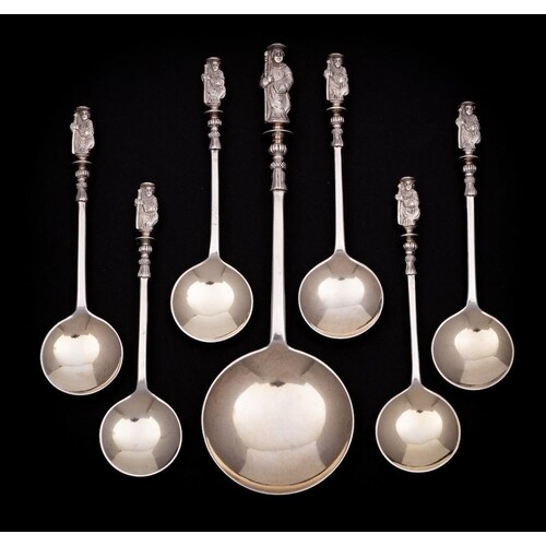 A set of six Victorian silver seal top spoons and a larger s...