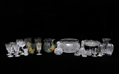 AN EDWARDIAN CUT GLASS PUNCH BOWL AND CUPS.