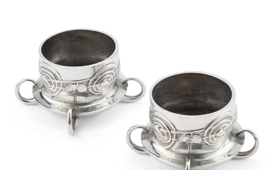 ARCHIBALD KNOX (1864-1933) FOR LIBERTY & CO, A PAIR OF TUDRIC PEWTER FERNER BOWLS
