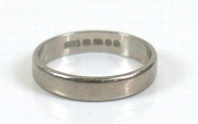 An 18ct white gold wedding band ring, 3.7mm wide, size N, 3....