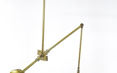 An Art Nouveau brass adjustable counter balance ceiling light with large flared vaseline glass