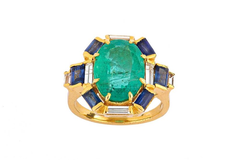 An emerald, sapphire and diamond dress ring