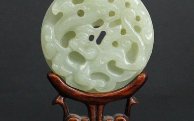 Chinese Carved Jade Qilin Disc on a Wooden Stand.
