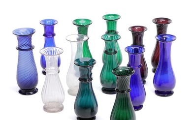 Collection of 13 coloured glass hyacinth vases, balustre shaped. 19th century. H....